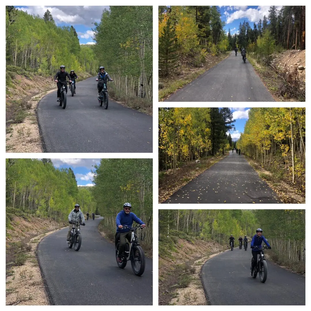 Friends e-biking scenic autumn trail.