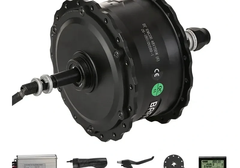 A black electric motor with some wires and other parts